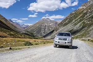 Off-road vehicle on a gravel track