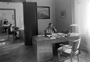Office, man sitting at his desk