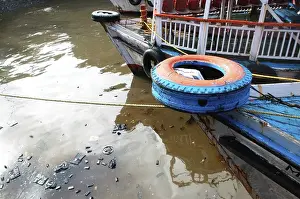 Oil floating at ferry boats due to container ship chitra colliding in sea Bombay Mumbai
