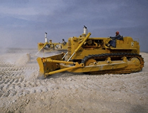 Oil industry in the Ras Tanura area, Saudi Arabia, D6H Tracked bulldozer in desert construction 1979, Asia