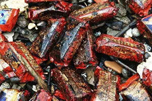 Category Historic EN Prints: Oil soaked biscuit packets due to container ship chitra colliding in sea Bombay Mumbai