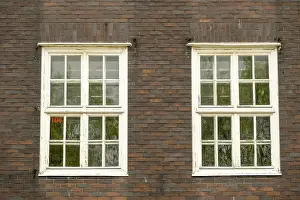 Old brick building with old double windows