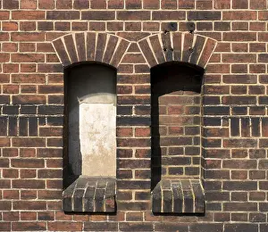 The old brick walls and closed windows