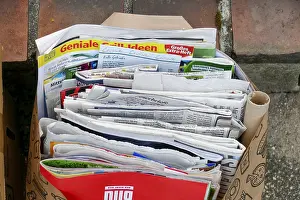 Old daily newspapers in a bag, waste paper