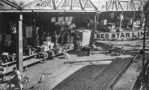 Old early 1900s photo of European emigrants travelling to the United States boarding steamship of the Red Star Line in
