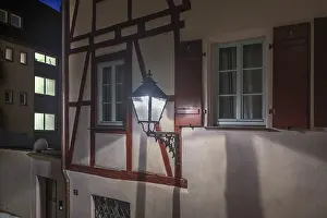 Framed Print : Old lantern on an old half-timbered house