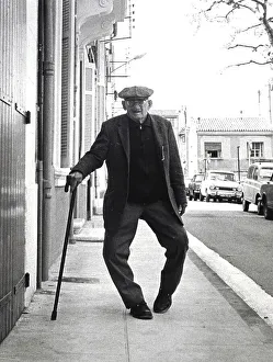 Old man with bow-legs, between 50s and 60s