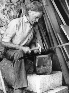 Old man dengling the scythe, shoemaker Cajetan Anker