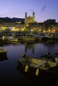Old marina at twilight and St. John the Baptist Church (back)