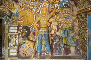 Old murals and sculptures inside the caves of the Buddhist temple and monastery Mulkirigala Raja Maha Vihara