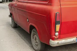 Back side of old red vintage van closeup