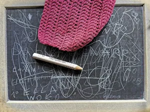 Old school blackboard with pen and wipe, school
