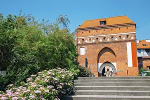 Old town Brama Klasztorna gate in Torun
