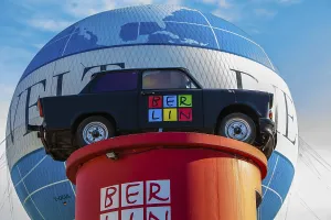 Old Trabant on a red pillar