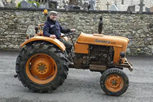 Category Oldtimer Prints: Old tractor Someca in front of church and chapel Sainte Nonne
