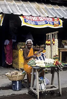 An old woman selling garlands, Tamil Nadu
