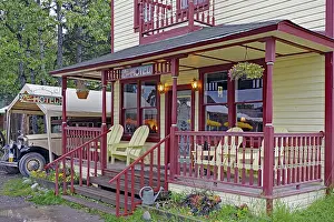 Old wooden hotel from the 1920s and a vintage car