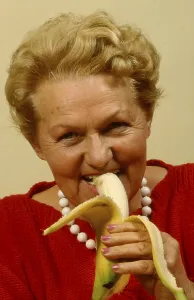 Older woman with banana