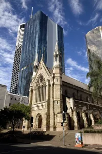 The oldest church in the city of Brisbane surrounded by skyscrapers