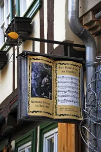 Opened, old songbook as advertising sign of a bookshop