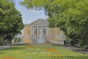Opera house built in 1886 and Curie-Platz park with Fontane