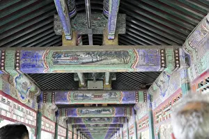 Framed Print : Ornate, painted ceiling beams in traditional architecture with rich detail