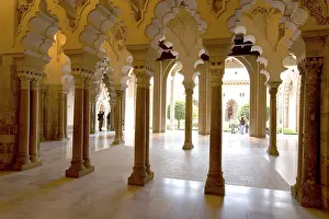 Ornate stone carved arched passageway of the Santa Isabel Patio