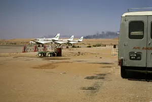 Oued Irara Krim Belkacem Airport, Hassi Messaoud, Ouargla Province, East Algeria, North Africa 1973 Beech 70 Queen Air twin propeller aircraft on the runway, Air Algerie Societe Nationale de Transport et Travail Aerien