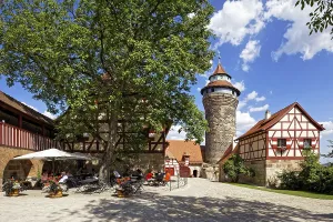Outer castle courtyard, lime tree in front