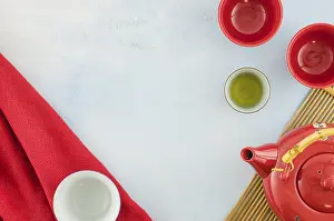 Overhead view chinese teapot teacups white background