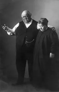 Two overweight people, historic picture from about 1910