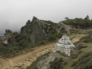 Painted and carved mani stome in Namche Bazaar