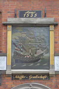 Painting with sailing ship and year at the entrance to the Schiffergesellschaft restaurant