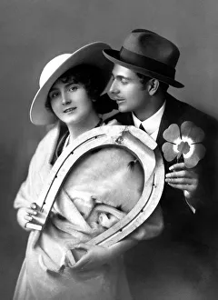Pair, pair of lovers, horseshoe and cloverleaf as lucky symbol
