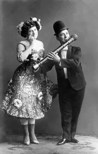 Pair, stage, theatre, man playing for his woman on a flute