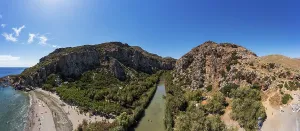 Palm beach, Preveli Beach at the end of the Kourtaliatiko Gorge