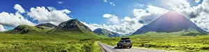 Panorama of Glen Etive and SUV BMW X3 with a roof tent