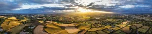 Panorama of Sunset over Fields and Farms from a drone