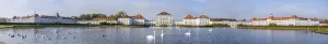 Panorama, swans swimming in front of Nymphenburg Palace