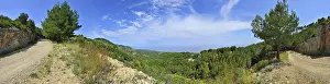 Panoramic landscape with mountain views, sunny day
