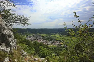 Panoramic view of Bad Uberkingen with thick forests and open skies