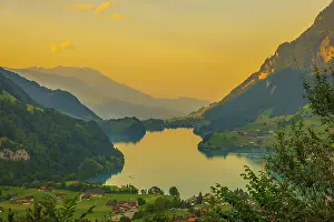 Panoramic View over Lake Lungern and Village with Mountain in Sunset in Lungern