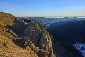 Panoramic view of rocky mountain landscape under blue sky and extensive view