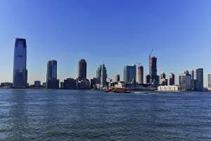 Panoramic view of the skyline of a big city on the water on a clear day