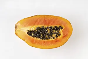 Papaya on a white background, close-up, flat lay