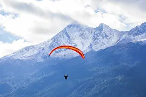 Framed Print : Paraglider and snowy Brennerspitze mountain in autumn Framed Print : Paraglider and snowy Brennerspitze mountain in autumn