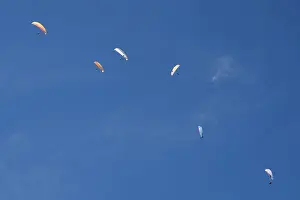 Paragliders in the sky above Brauneck