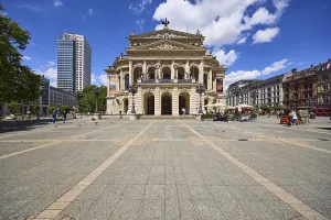Parktower and Alte Oper at Opernplatz under a blue sky with cumulus clouds in Frankfurt am Main