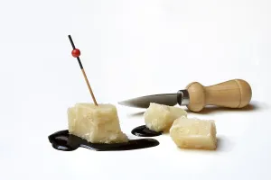 Parmesan cheese, pieces of cheese and crema di balsamico