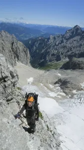 Passage via ferrata with a large exposure and an amazing view of the mountain range and the glacier
